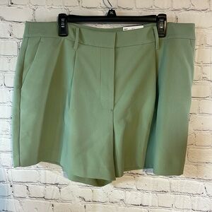 NINE WEST sage green shorts. Two side pockets. Faux back pockets. New with tags.